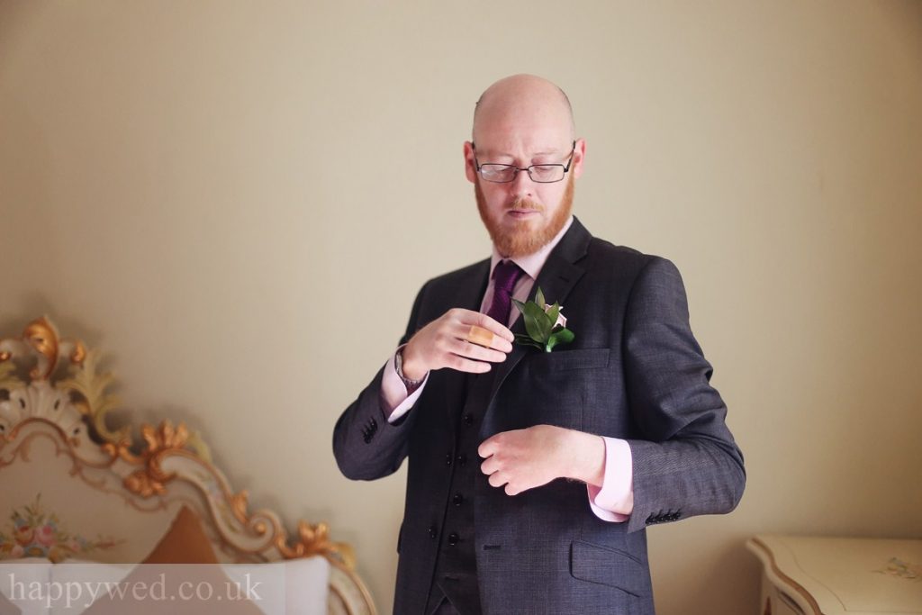 Groom getting ready at manor parc hotel Cardiff