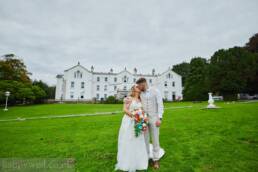 Bride and groom at Court Colman grounds
