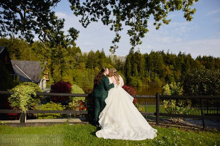 Canada lodge and lake bride and groom portrait