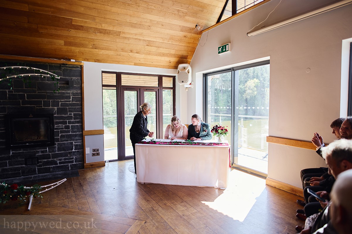 Canada lodge and lake wedding ceremony