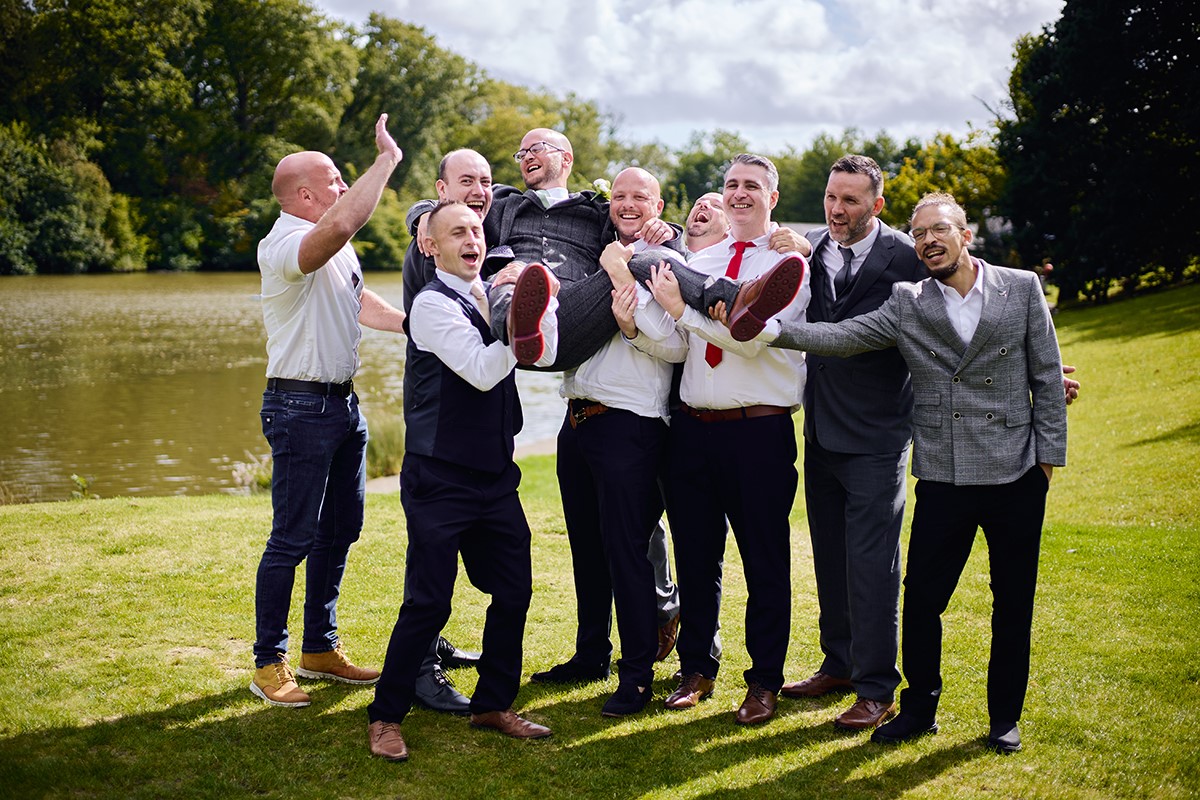 group and couple portraits Canada lodge and lake
