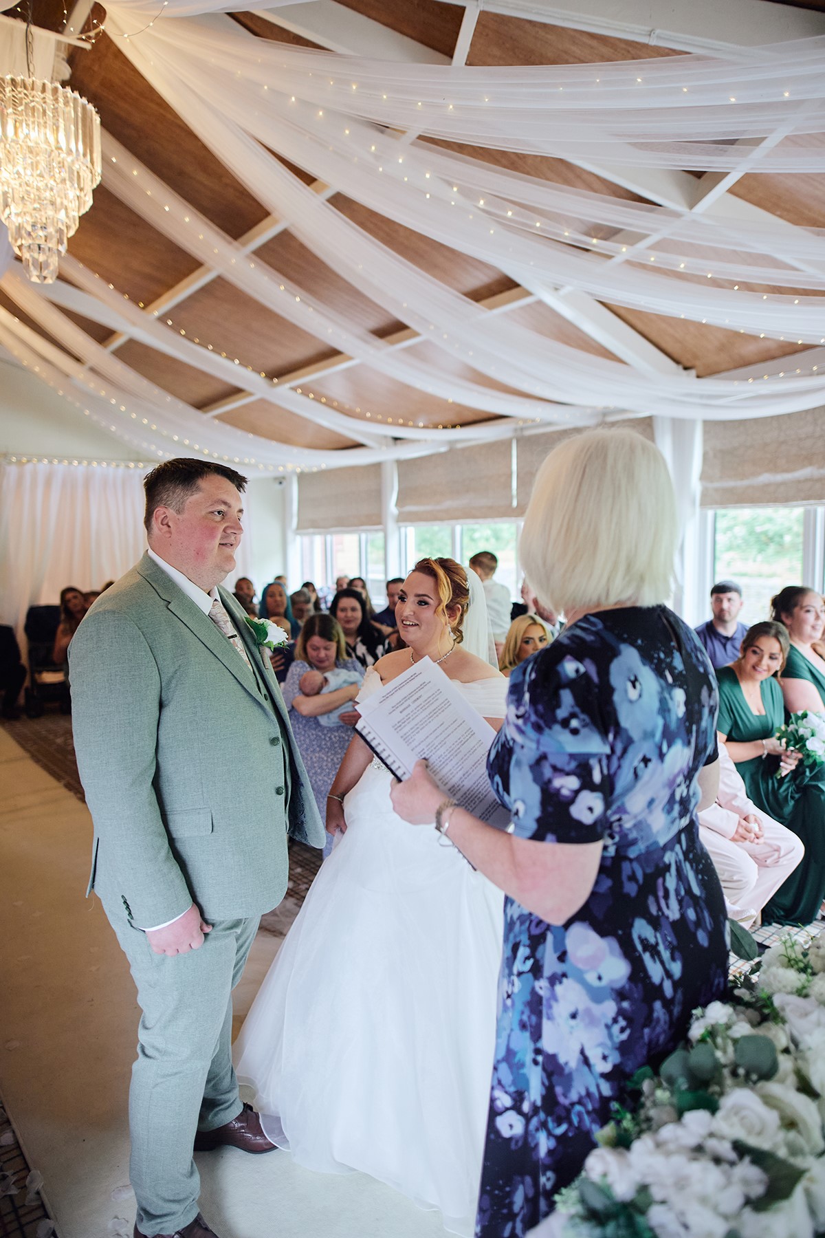 Heritage park hotel wedding ceremony in conservatory