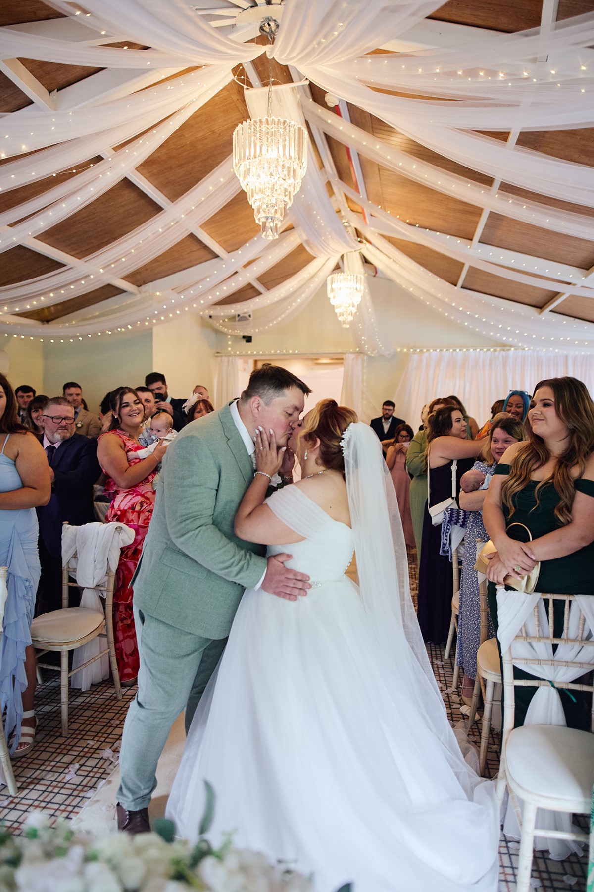 Heritage park hotel wedding ceremony in conservatory