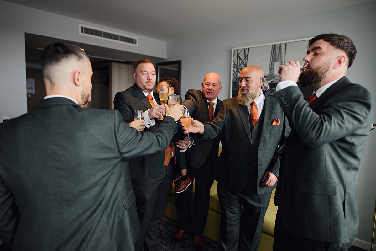 bride and groom getting ready at the Mercure Hotel Newport