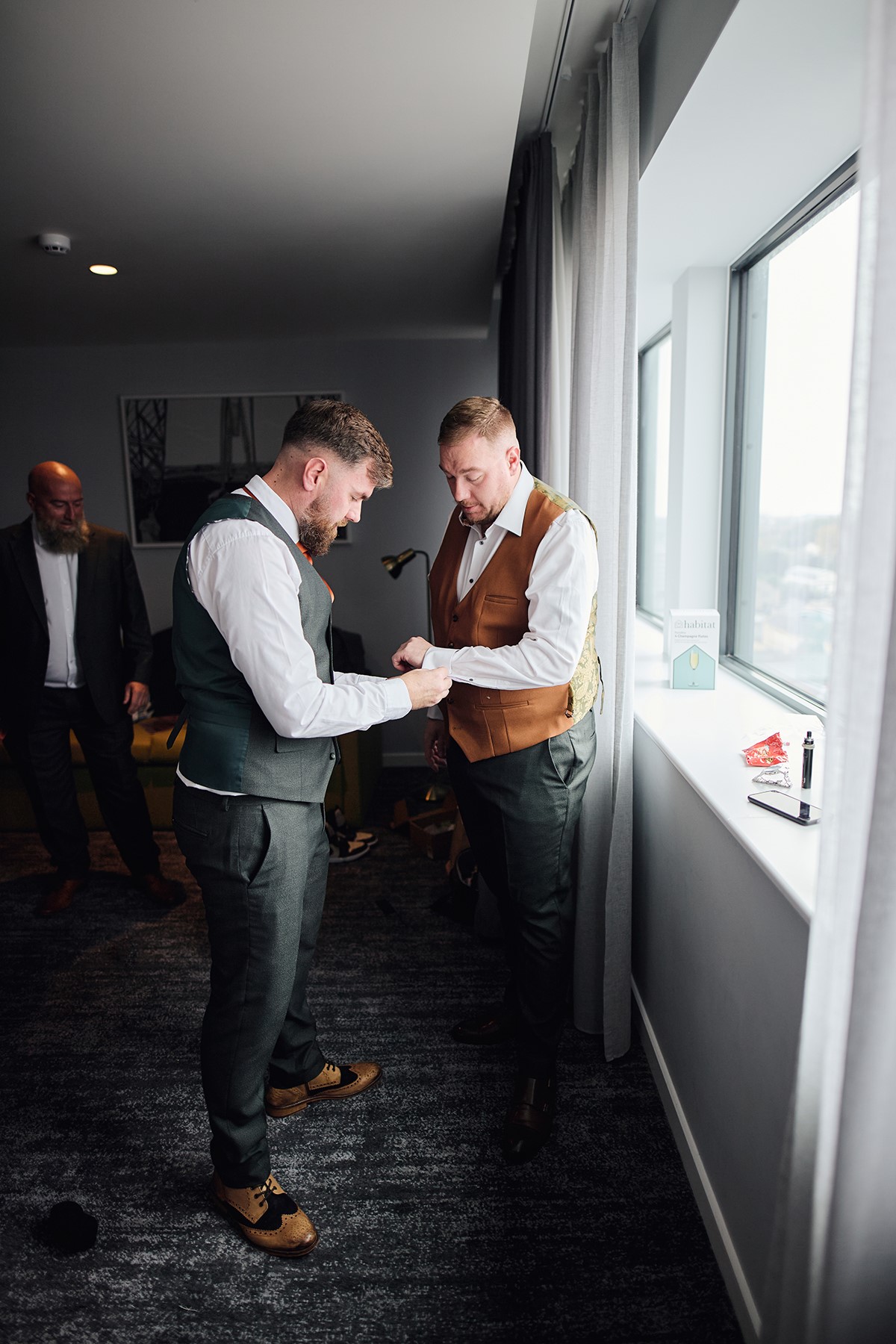 bride and groom getting ready at the Mercure Hotel Newport