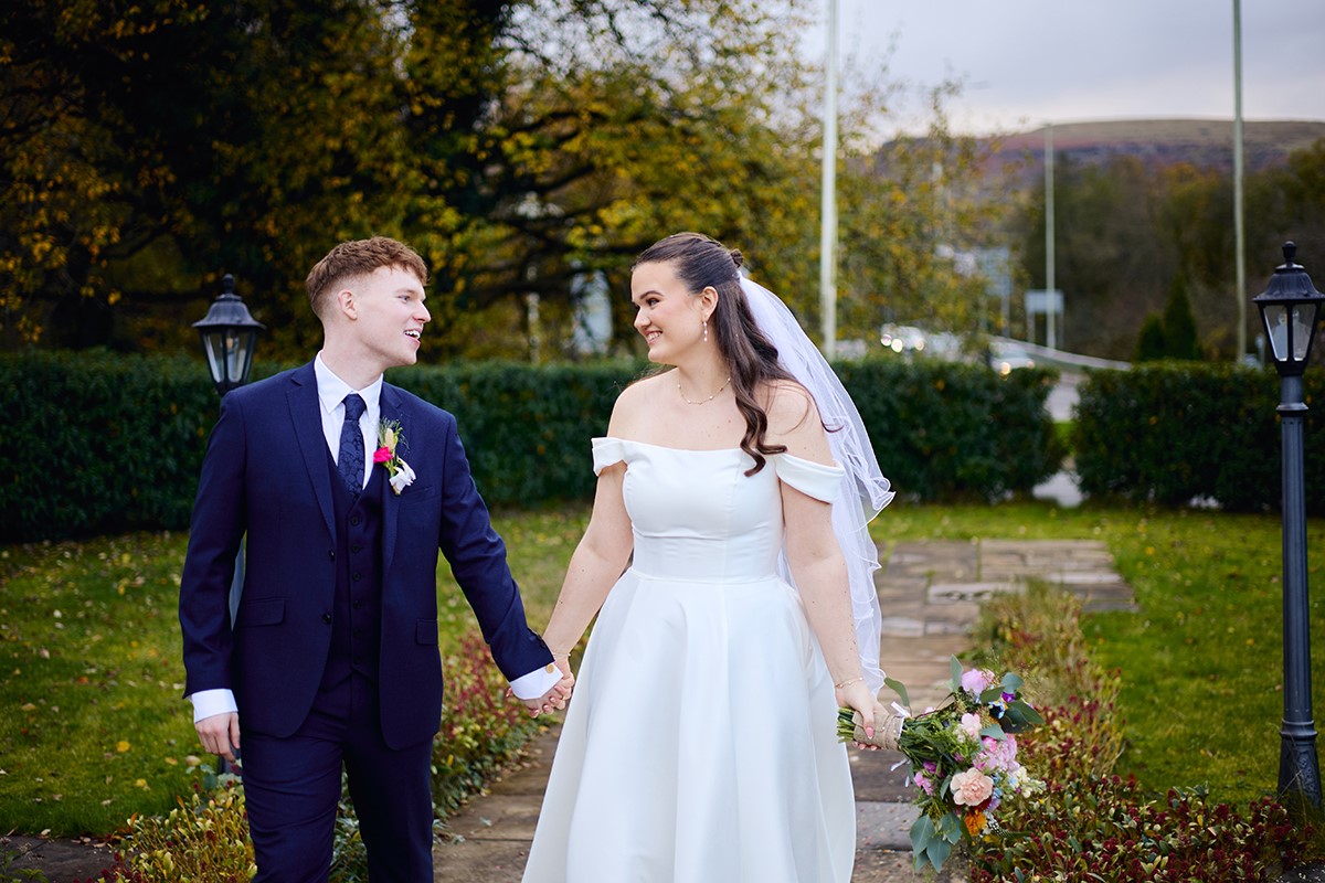 bride and groom portraits outside Heritage park hotel